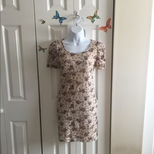 Floral dress medium but feels like a small.